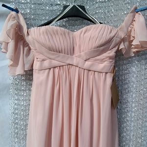 peach colored simple but elegant wedding dress